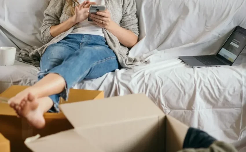 Image of a person reviewing immigration documents, symbolizing the need for the address change procedure.