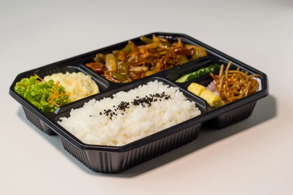 Image of a homemade lunch box (bentō), illustrating the literal meaning of 'tebentō.'