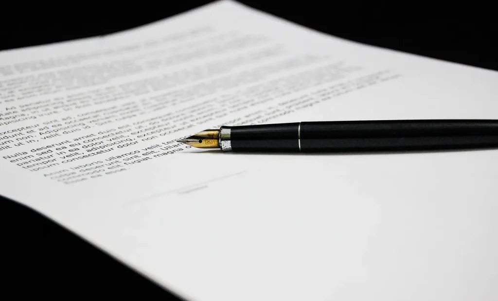 Image of documents and a stamp, symbolizing the specific paperwork required by certain countries.