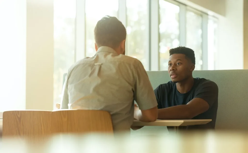 Image of a business meeting, emphasizing the preparation done before the meeting.