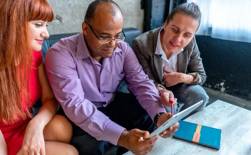 Image of a serious business meeting, emphasizing the need for caution when using casual language.