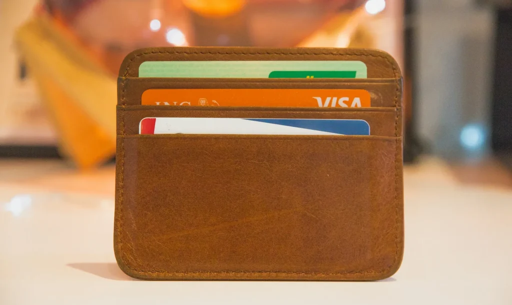 Image illustrating the factors considered for a foreigner's card loan application approval, such as income and visa status.