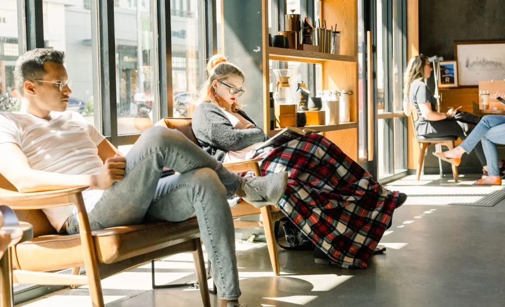 Image of the unique 'sleeping in the bookshelf' concept at BOOK AND BED TOKYO SHINJUKU.
