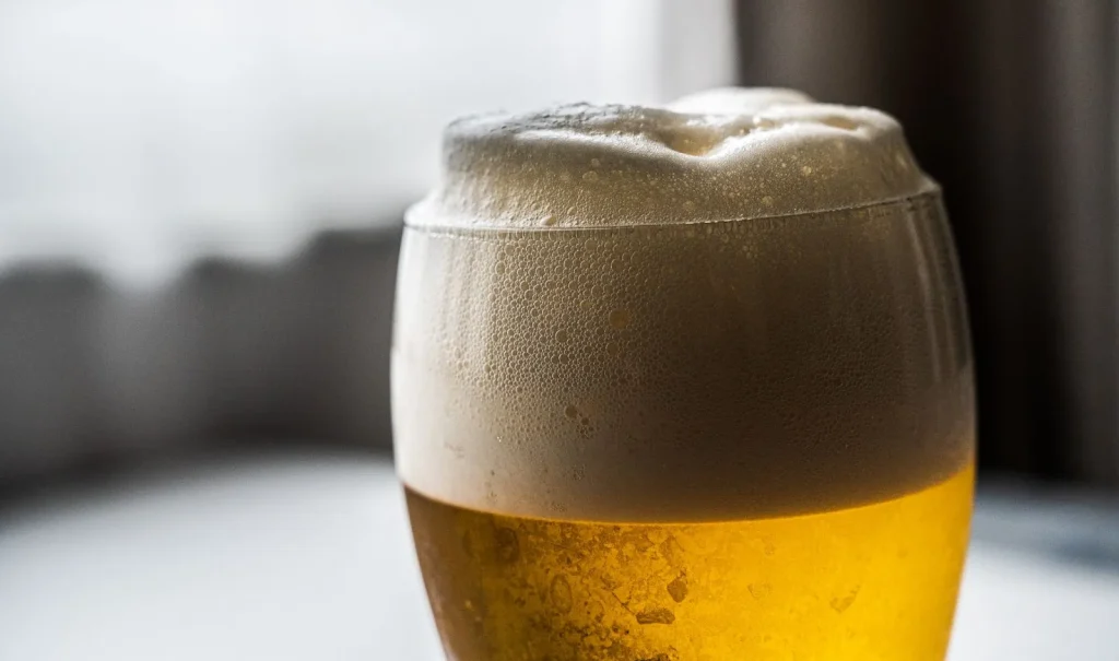 Image of craft beer and food, highlighting the local brewery experience.