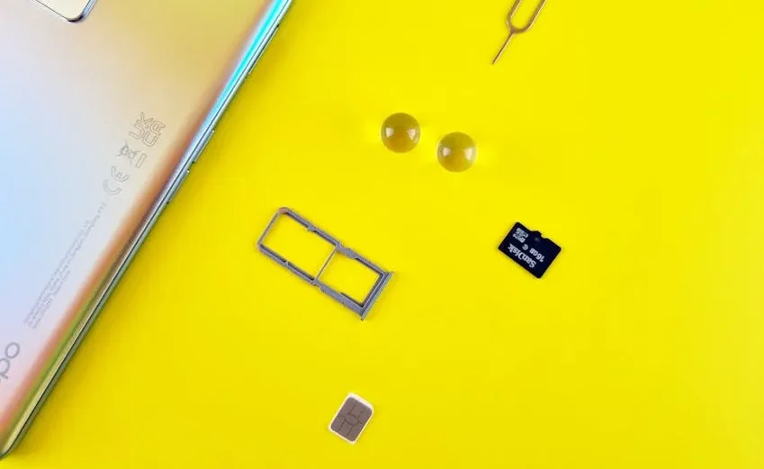 Image of a prepaid SIM card being inserted into a phone, suggesting a more stable internet option.