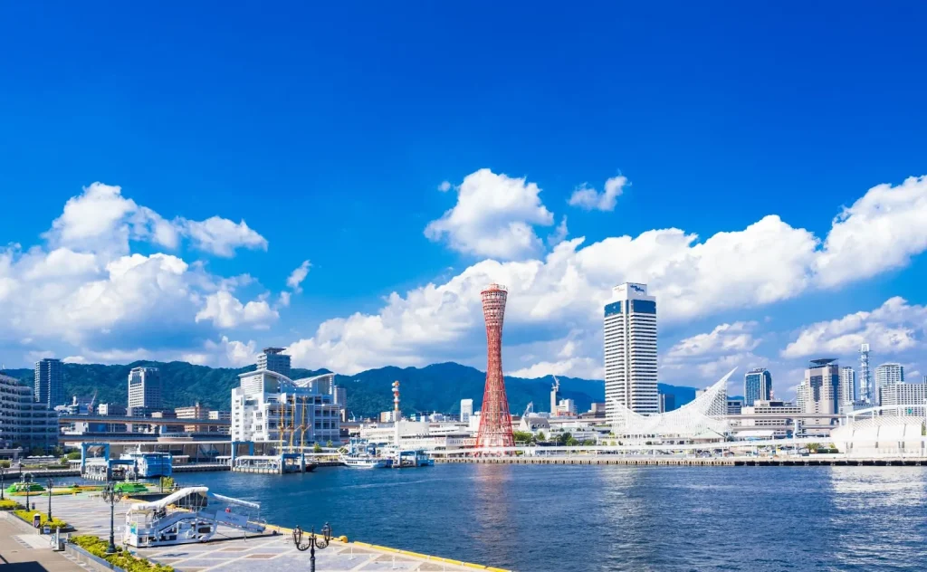 Image of the iconic Kobe Port Tower and harbor area, highlighting the city's international port identity.