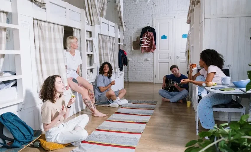 Image of a cozy, shared bedroom in a dormitory style setting.