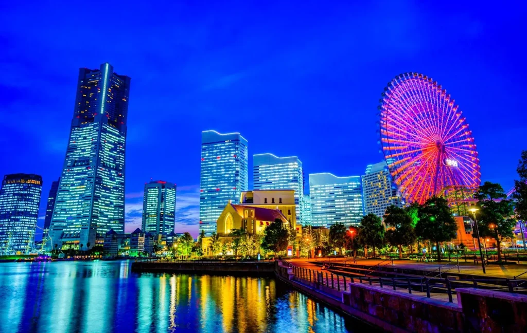 Image of the Yokohama skyline and waterfront, emphasizing its modern, international feel.