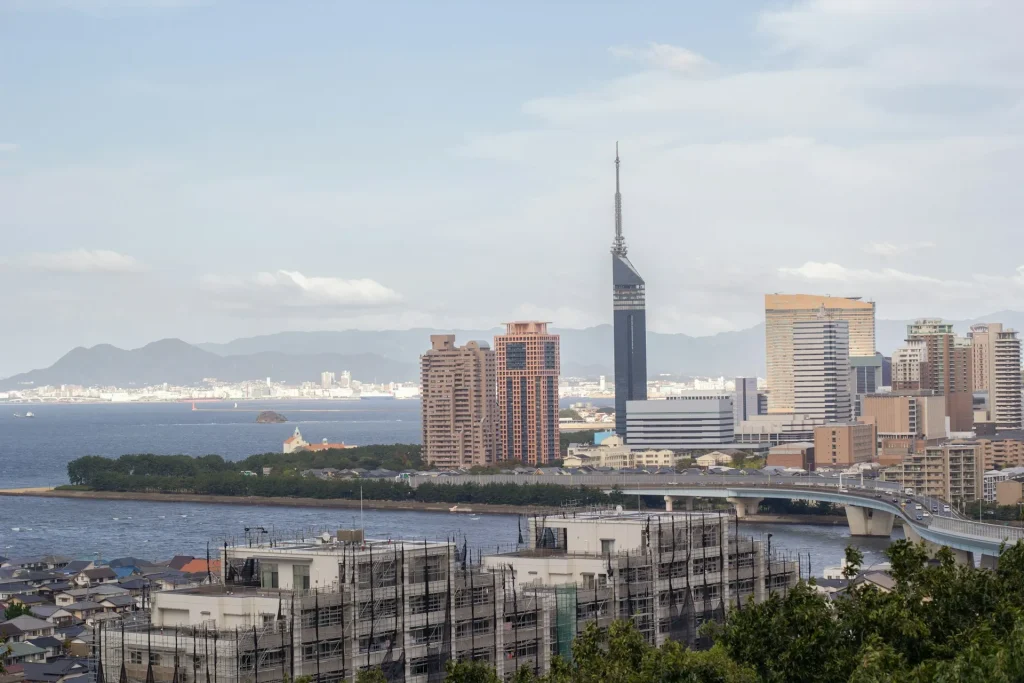 Image of the city skyline and harbor in Fukuoka, highlighting its modern, vibrant atmosphere.