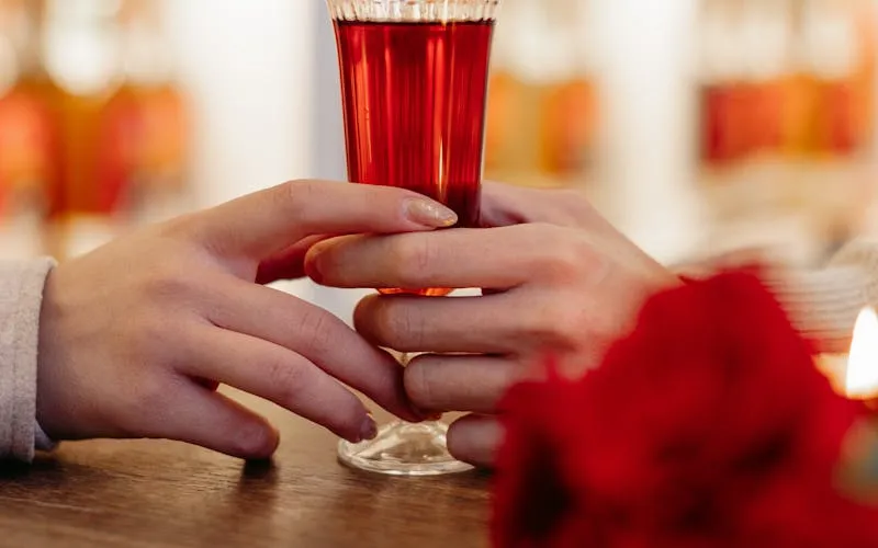Image of a young couple on a romantic date, with the atmosphere suggesting a serious conversation or confession.
