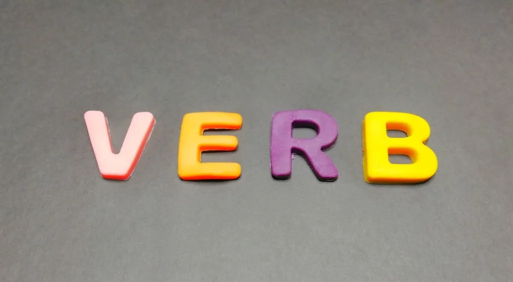 Image illustrating the difference between intransitive and transitive verbs in Japanese with example sentences and particle usage.