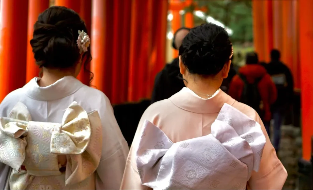 Image showing a detailed Obi tied in an elaborate bow on a woman's kimono.
